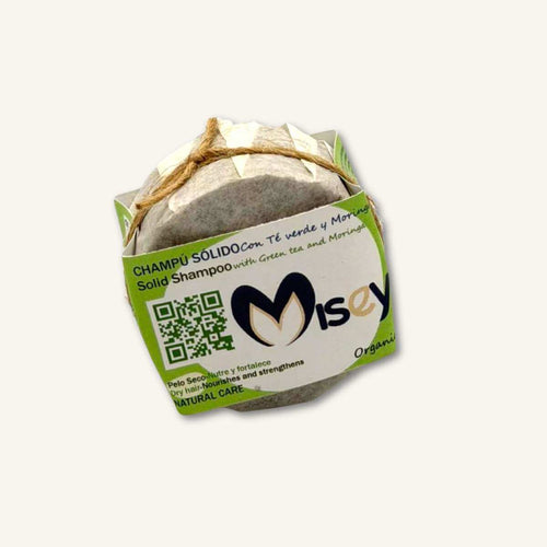 Champú sólido natural de Té Verde y Moringa de Misey, ideal para reparar cabello seco y castigado en envase sostenible.