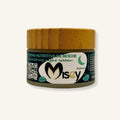 Crema nutritiva de noche Misey en envase de vidrio con tapa de bambú sostenible.